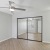 bedroom closet with mirrored sliding doors