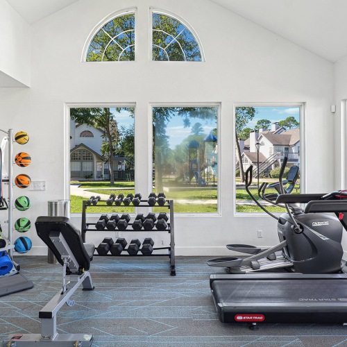 workout room surrounded by windows